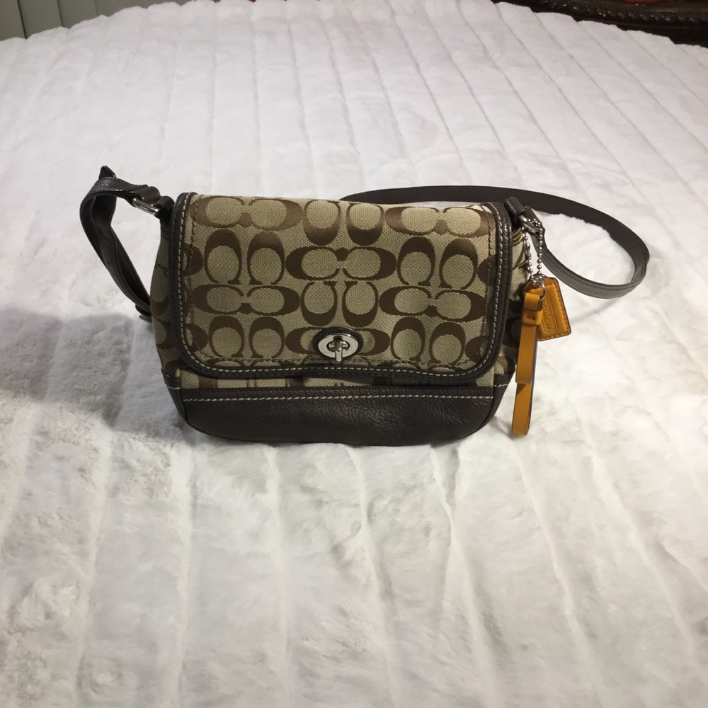 Coach crossbody  look at picture for damages